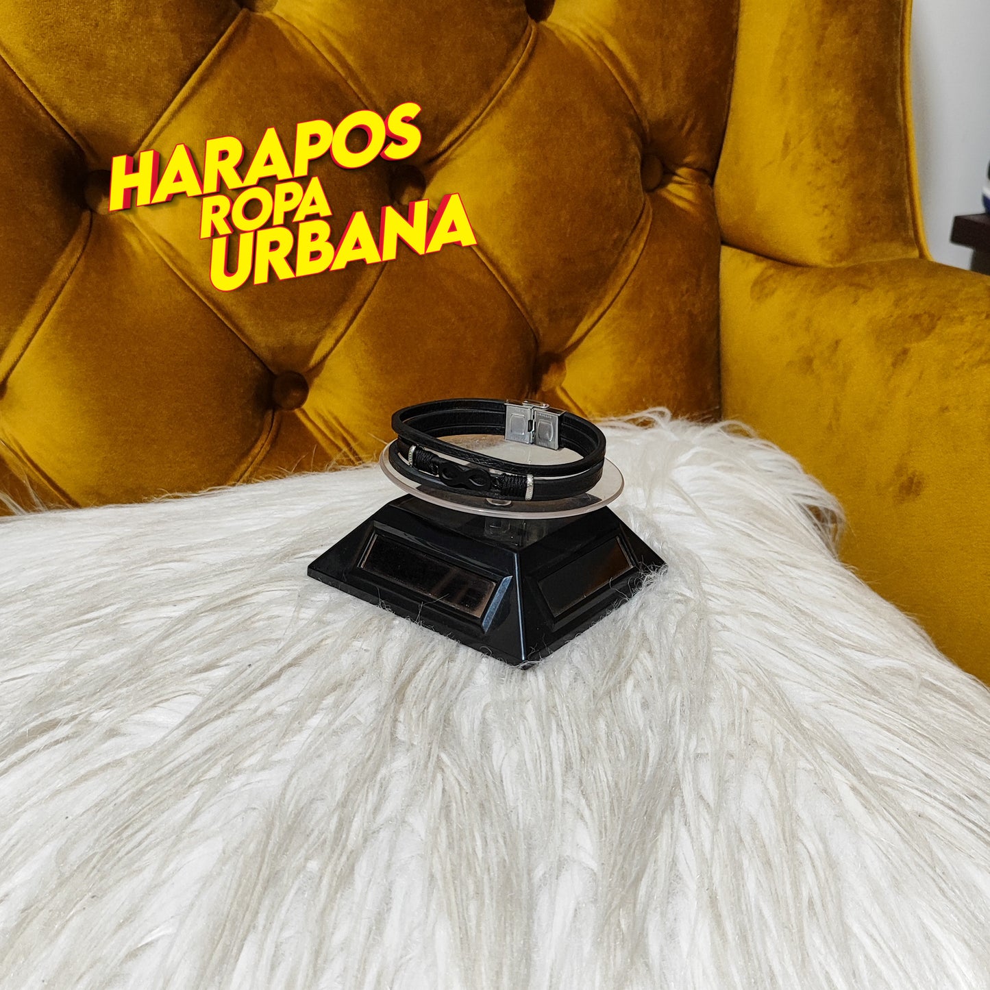 Manilla negra de cuero con diseño infinito