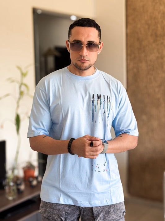 Polera amiri celeste letras derretidas