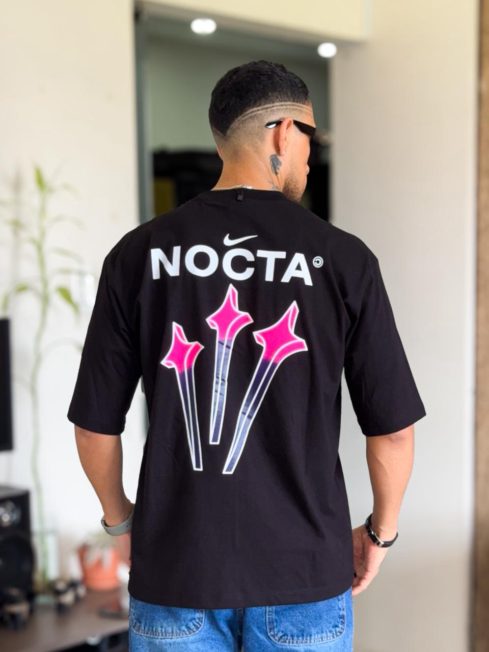 Polera Nike Nocta Colorido negra