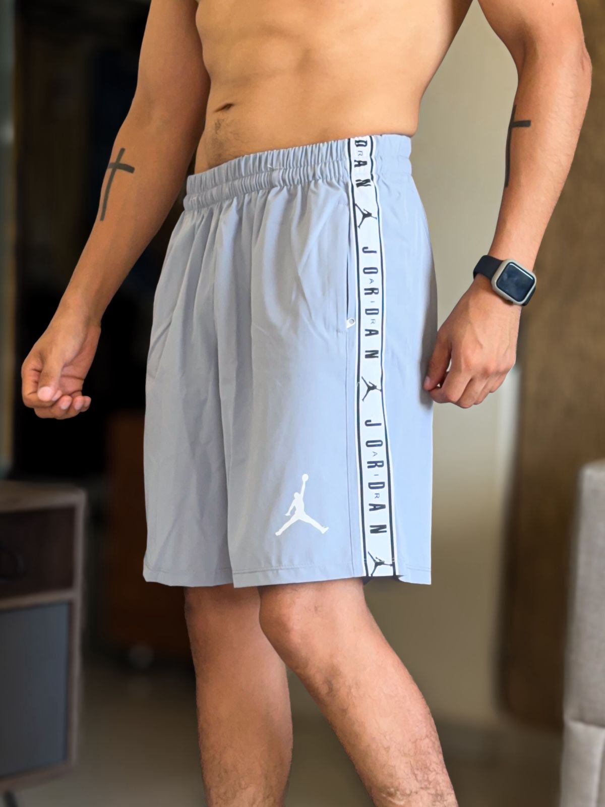 Short jordan air plomo franja lateral