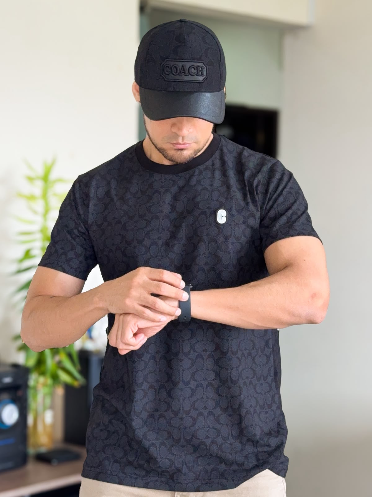 Polera COACH sellada cobertura negro