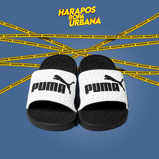 Chinela puma blanca con huecos