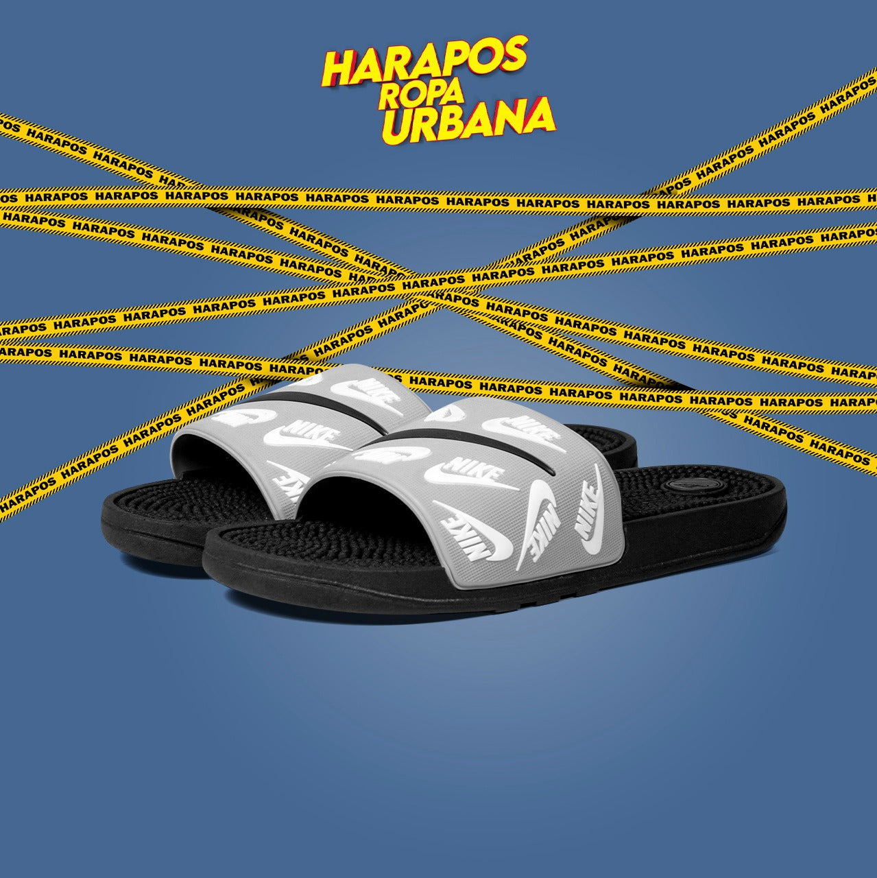 Chinela nike plomo con swoosh blanco
