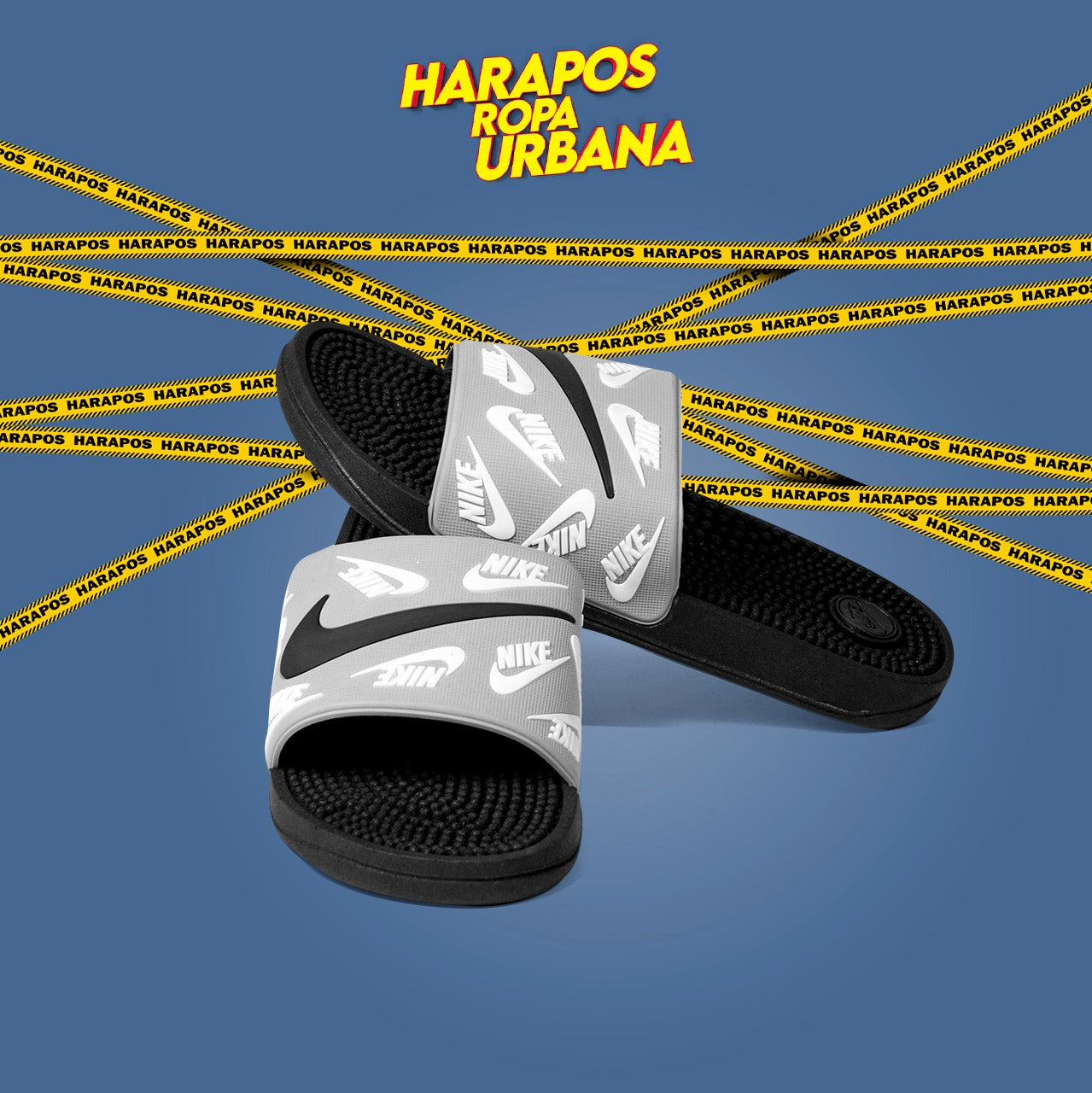 Chinela nike plomo con swoosh blanco