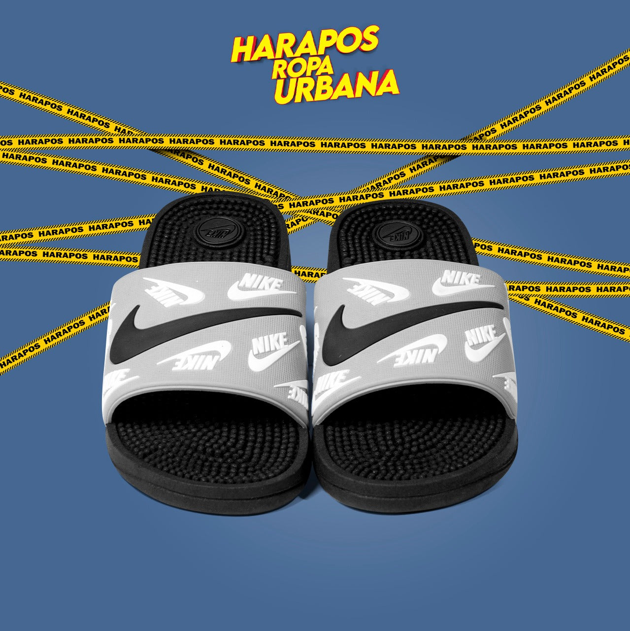 Chinela nike plomo con swoosh blanco